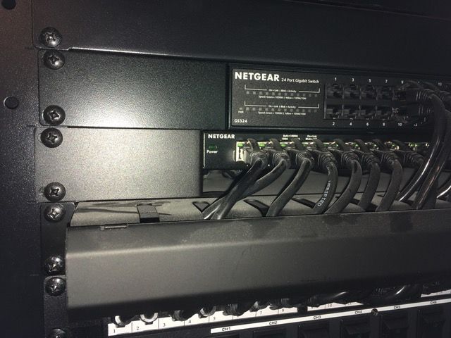 Top is GS324 with Netgear Braket